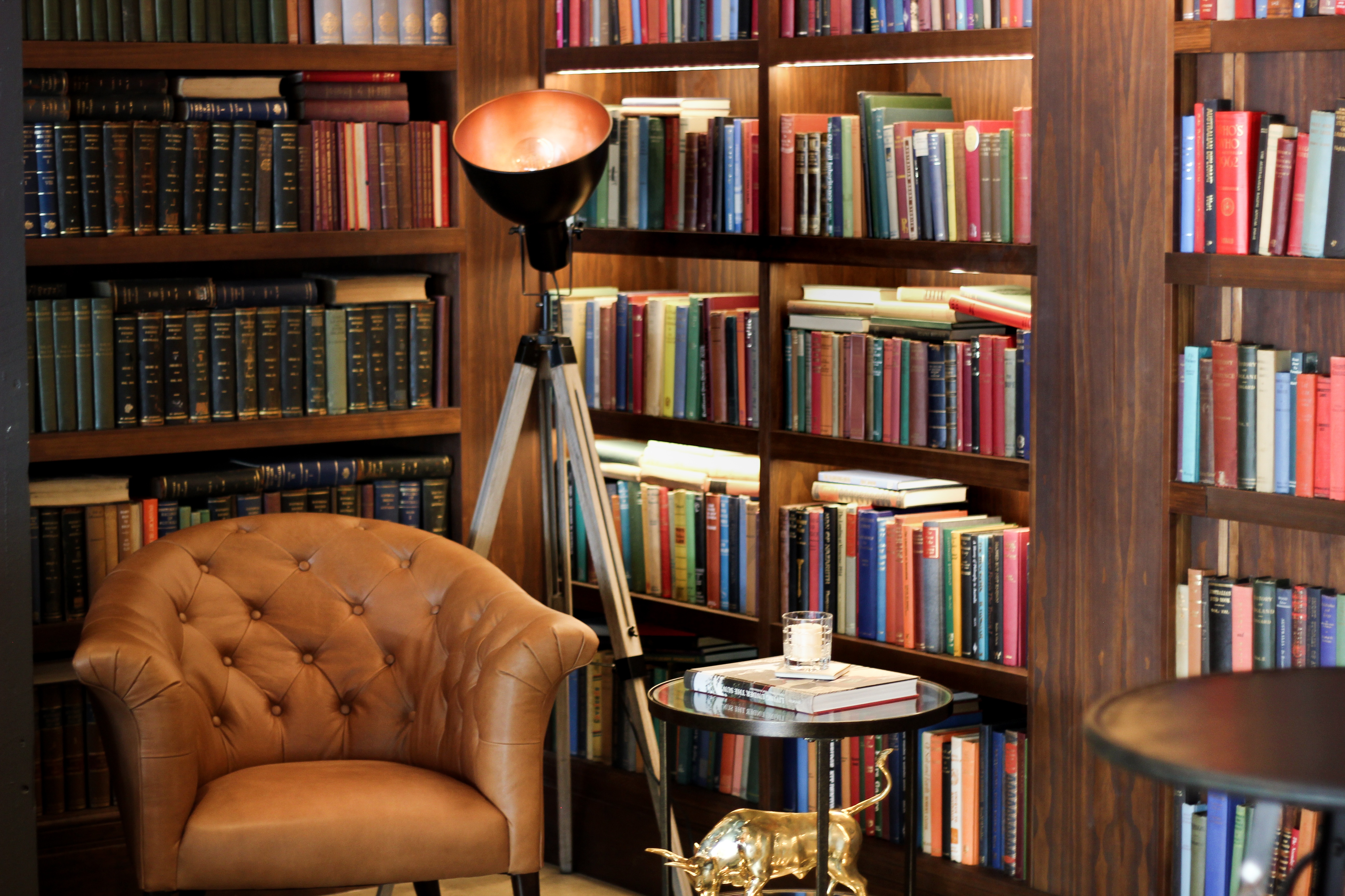 Woolloongabba Real estate office with Arm Chair & Books