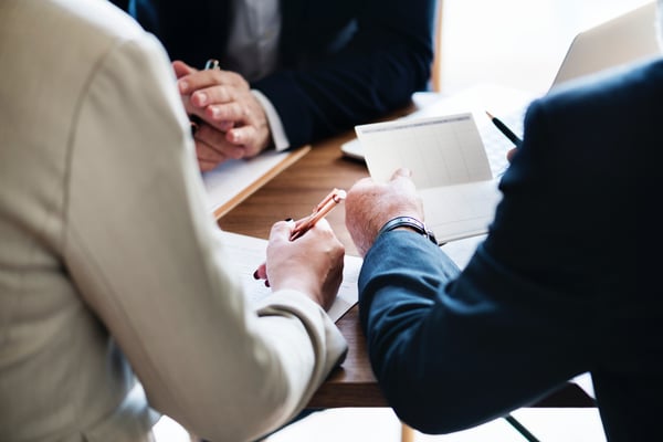 new home buyers meeting with a mortgage broker