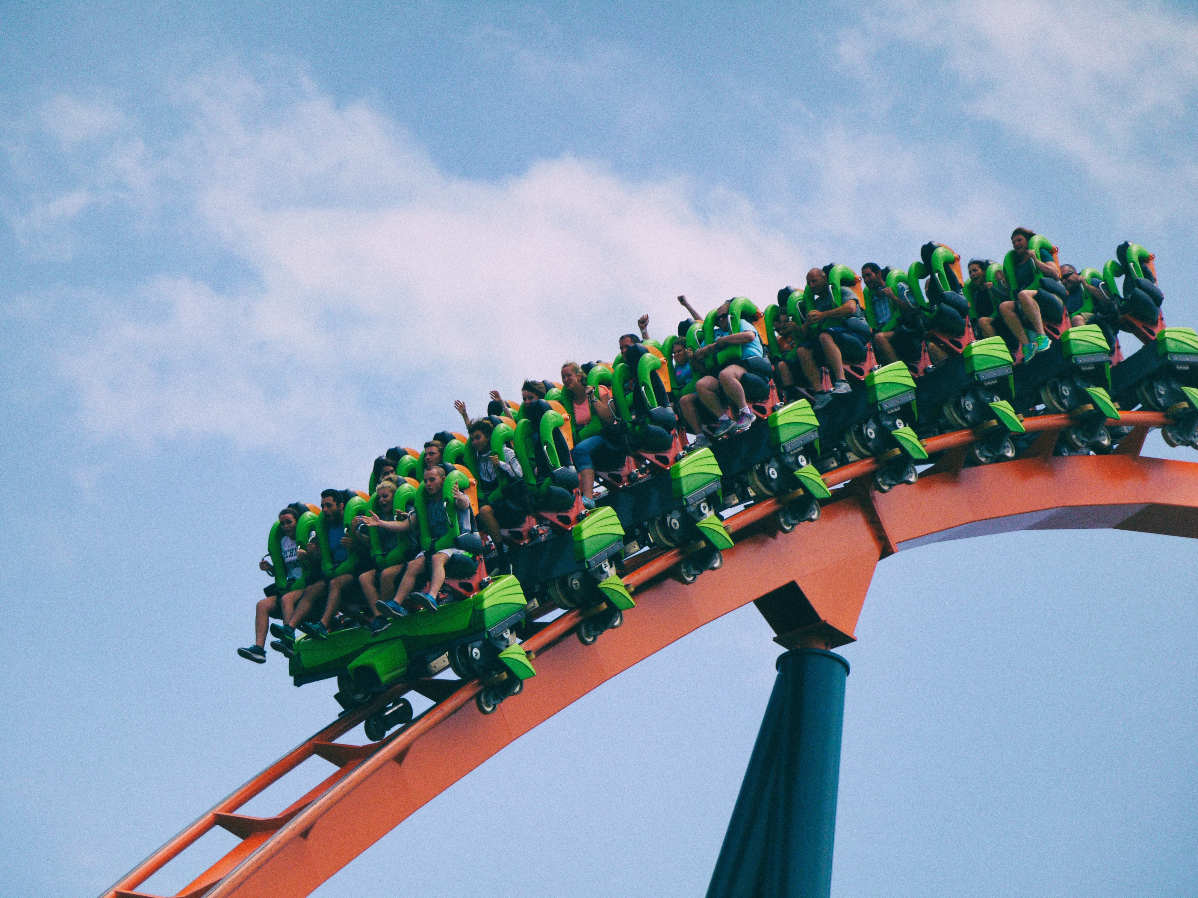 people on a rollercoaster