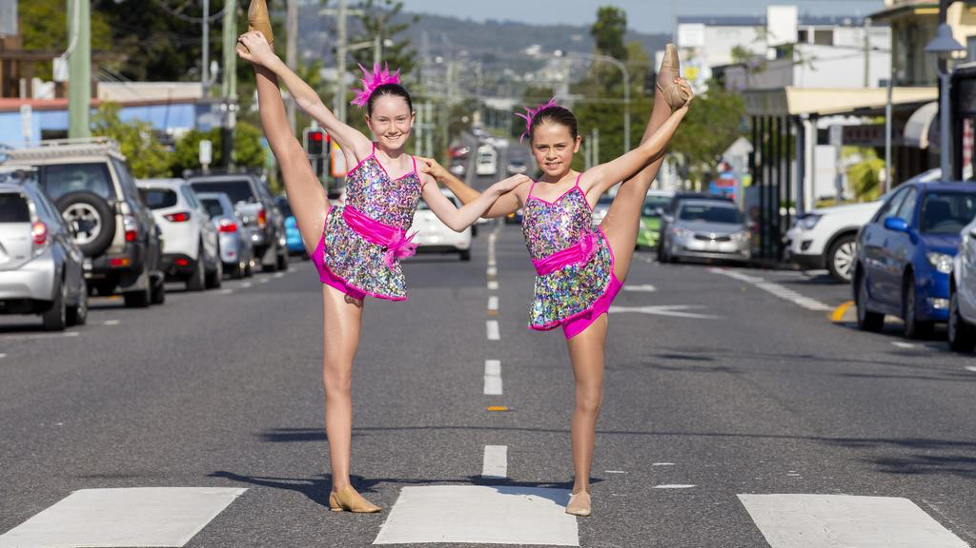 two girls dancing in Sherwood street